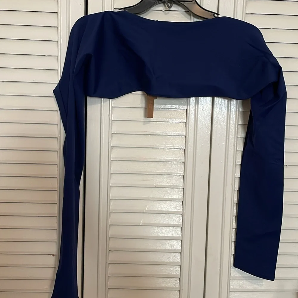 Skims sculpting swim long sleeve shrug.